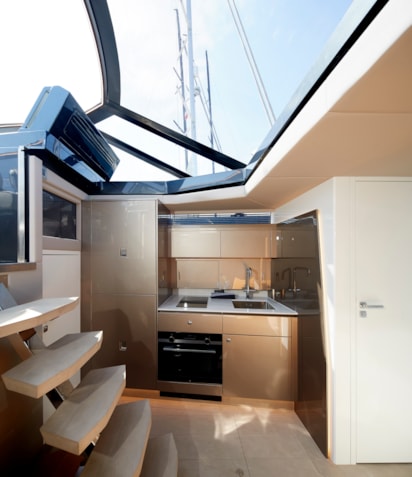 05-Bronson-50-int-galley-with-three-fridges,two-freezer,icemaker,sink-and-cooker